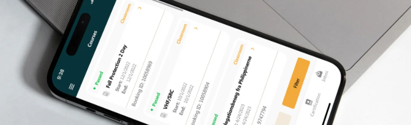 Phone screen with RelyOn Business Portal Student App open with training courses on display